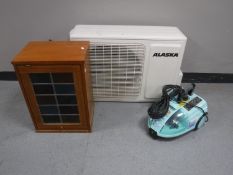 A small teak cabinet,