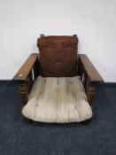 An early oak adjustable fireside chair