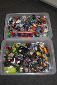 Two crates of Lego and similar building materials, plastic toy items etc.