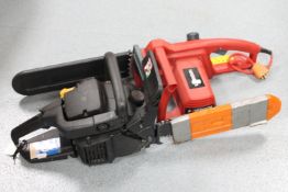 A Maccat Mculloch petrol chainsaw,