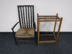 An early 20th century country chair and an oak stick stand