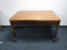 A Victorian mahogany pull out dining table