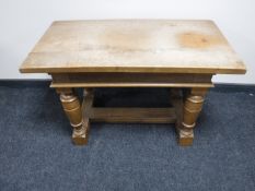 An oak refectory style coffee table