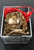 Two crates containing lady's handbags, ornaments, china, figures,