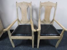 A pair of 19th century stripped pine armchairs
