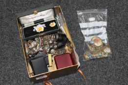 A box of costume jewellery, wrist watch, bangles,