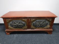 A 19th century carved painted oak blanket chest