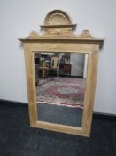 An antique style pine mirror