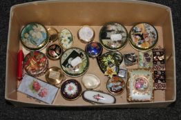 A box of Past Times and other pill boxes,