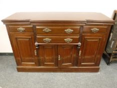 A late Victorian break front mahogany sideboard