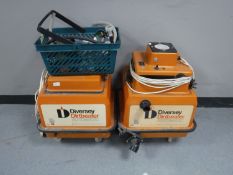 Two Dirt Beater automatic wet vacuums