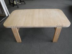 A contemporary beech wood low table