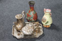 A silver plated gallery tray containing a four piece plated tea service and a silver lidded sugar