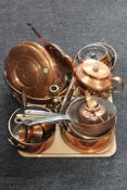 A tray of antique and later copper, saucepans,