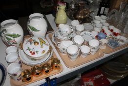 Three trays containing Royal Worcester Evesham dinner ware, Royal Worcester gilt porcelain,