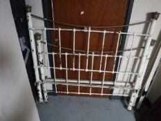 A Victorian brass and cast iron bedstead