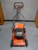 A Husqvarna petrol lawnmower