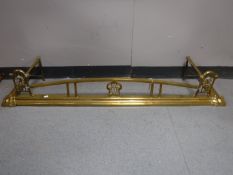 A late Victorian brass fire curb