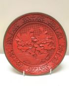A Chinese cinnabar plate