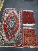 Three Eastern rugs