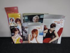 A collection of late 20th century advertising pictures and panels for Weller Hair