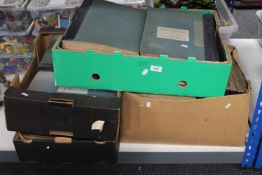 Four boxes containing Braile books