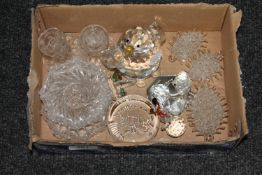 A small box containing crystal animal ornaments,