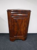 A Victorian mahogany corner cabinet