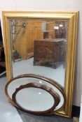 A gilt framed bevelled mirror,