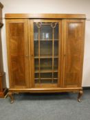 A mid twentieth century continental oak bookcase