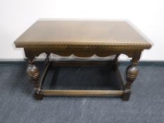 An oak pull out coffee table