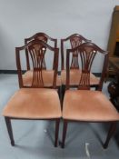 A set of four antique style mahogany dining chairs