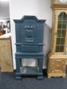 A 19th century painted cabinet on stand fitted a drawer