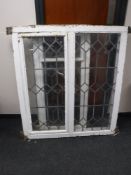 Two wooden framed leaded glass windows