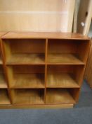 A pair of light pine storage cubes