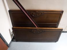 A set of oak bed ends with side rails