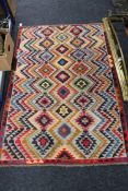 An Afghan wool rug,