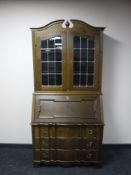 A continental oak bureau bookcase