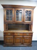 A colonial style triple glazed door dresser