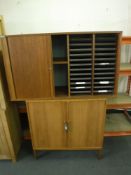 A Thorengaard teak shutter door office system,