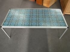 A contemporary tiled coffee table