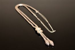 A silver snake necklace CONDITION REPORT: I cannot see a hallmark but in my opinion
