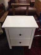 A contemporary white two drawer chest,