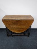 An oak gate leg table