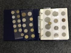 A folio containing a large collection of British, American and other foreign coins.