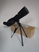 A spotting scope on tripod stand