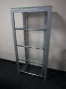 A contemporary metal and glass five tier open shelving unit