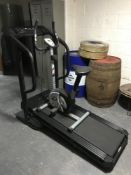 A Body Sculpture exercise bike and a Weslo Cadence 920 running machine