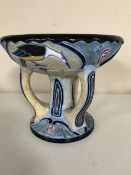 An Amphora art pottery comport, stylized tri-form base with bird decoration, numbered 13 to base,