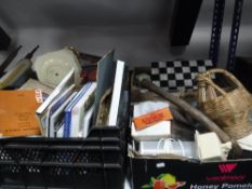 Four boxes of miscellaneous books, marble chess board, vintage links golf balls,